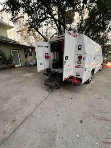 Magnet Plumbing service vehicle on-site for Water Heater Repair in Gouverneur